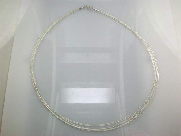 STERLING SILVER 7 THIN STRAND CHAIN 16". 4.7 GRAMS.