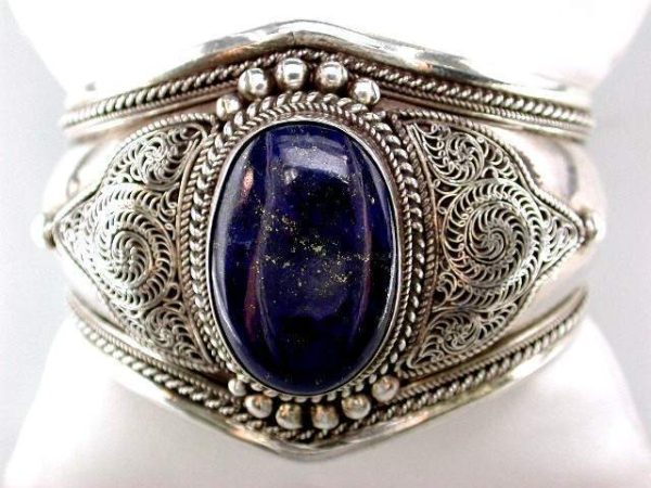 STERLING SILVER LAPIS CUFF BRACELET. THE LAPIS MEASURES 30 x 20.5 MILLIMETERS. TOTAL WEIGHT: 63.8 GRAMS.