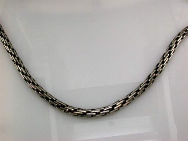 STERLING SILVER FANCY ROUND CHAIN. THE CHAIN IS 26 INCHES IN LENGTH BY 5.75 MILLIMETERS IN WIDTH. TOTAL WEIGHT: 44.4 GRAMS.
