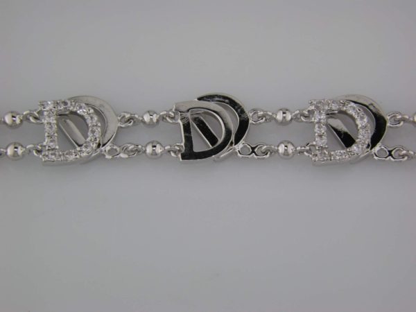 STERLING SILVER CHRISTIAN DIOR LOOK-A LIKE BRACELET WITH CZ.