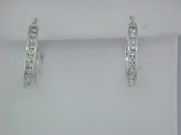 STERLING SILVER HOOPS WITH CUBIC ZIRCONIAS. 5.6 GRAMS.
