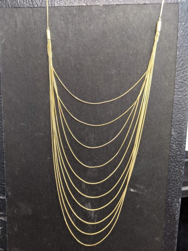 GOLD PLATED MULTI STRAND NECKLACE. WEIGHS 13.5 GRAMS.