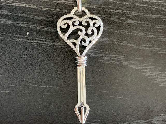 14K WHITE GOLD DIAMOND KEY PENDANT .80PTS
