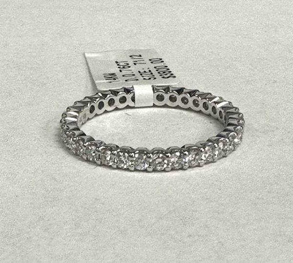 14K W/G DIAMOND (MINE GROWN) ETERNITY BAND FEATURING 0.76 PTS OF RBC DIAMONDS. 1.2 DWT. SIZE 7.5