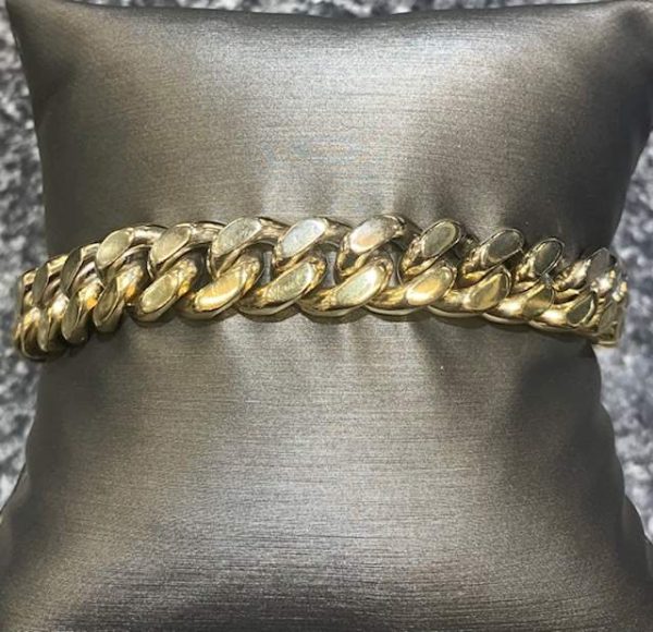 14K 2-TONE GENTS 9" CUBAN LINK BRACELET WEIGHING 68.2 DWT. OR 106.3 GRAMS.