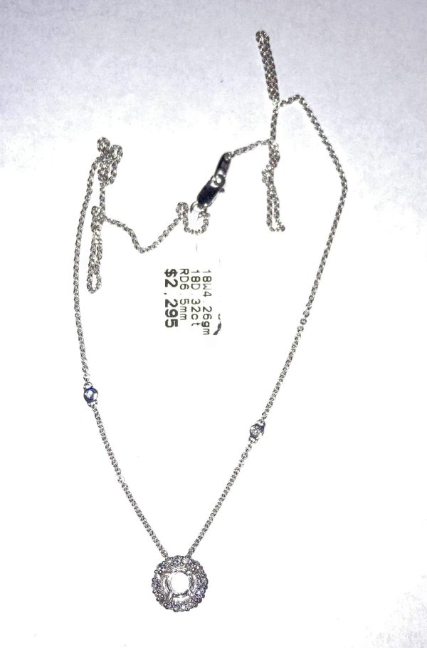 18K W/G OPEN MOUNT PENDANT ON A W/G 18K 16" CHAIN, PENDANT CONSISTS OF 18 RBC DIAMONDS WEIGHING A TOTAL OF 0.32 PTS, GOLD WEIGHT:2.8 DWT.