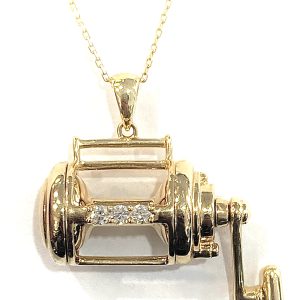 GOLD FISHING REEL WITH DIAMONDS