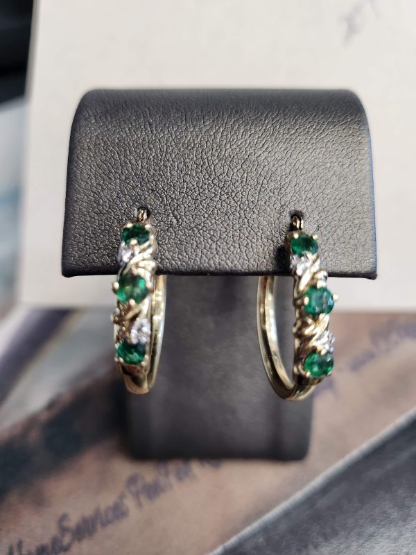 14K EMERALD & DIAMOND HOOP EARRINGS. APPROXIMATELY .50CTTW EMERALDS, APPROXIMATELY .10CTTW DIAMONDS. 2.8DWT