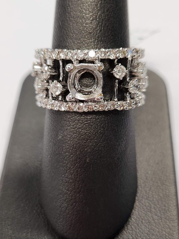 18K W/G DIAMOND THICK BAND MOUNTING WITH A TOTAL OF 2.72 CTS OF PAVE SET RBC'S. 4.6 DWT.