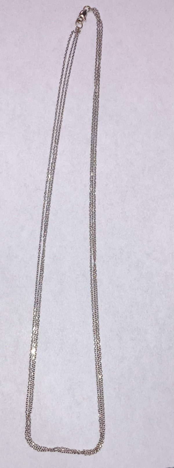 14K WHITE GOLD 18" TRIPLE STRAND CHAIN, WEIGHING 2.8 DWT.