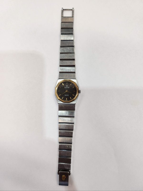 CONCORD MARINER 5G. STAINLESS STEEL WITH YG BEZEL AND YG NUMBERED DIAL.