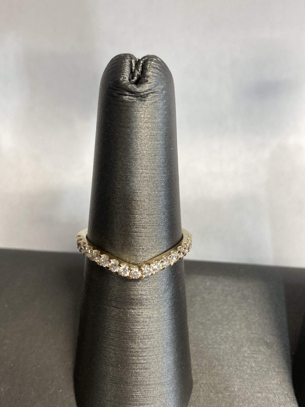 14K YELLOW GOLD CURVE LAB GROWN DIAMOND BAND W/ 17 ROUND BRILLIANT DIAMONDS WEIGHING APPROX 0.38 TCW.           COLOR: E-F CLARITY: VS1-VS2 DIS#518287 COMES W/ CARD AND POUCH. 1.2 DWT