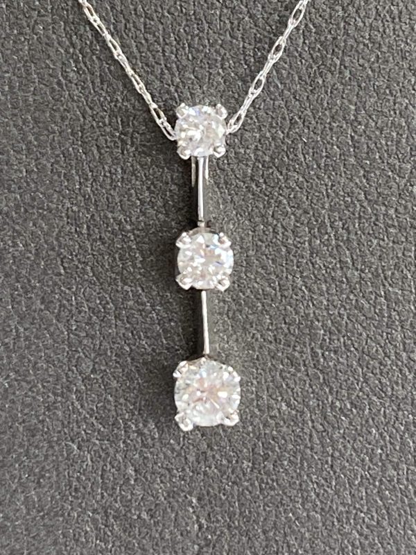 14K W/G NATURAL DIAMOND PAST, PRESENT AND FUTURE NECKLACE FEATURING 0.50 PTS OF ROUND BRILLIANT CUT DIAMONDS TCW. 2.00 DWT.
