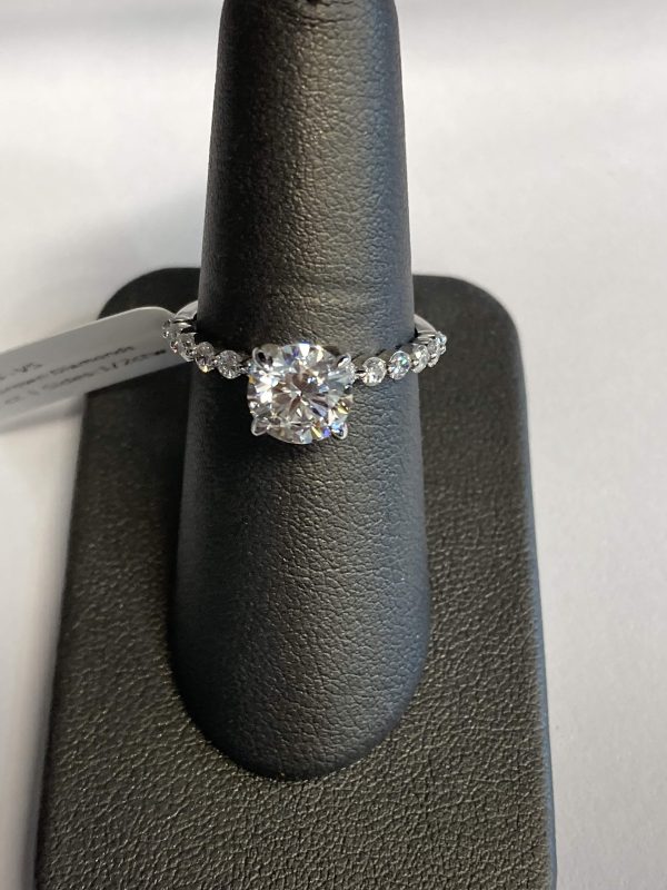 14K WHITE GOLD BUBBLE ENGAGEMENT RING FEATURING 15 ROUND BRILLIANT LAB GROWN DIAMONDS. CENTER STONE; 1.53 CTS, COLOR: F, CLARITY: VS. SIDE STONES; 0.49, COLOR: E-F, CLARITY: VS.  1.7 DWT, SIZE 6.75. IGI# 35J157132405 COMES W/ CERT CARD