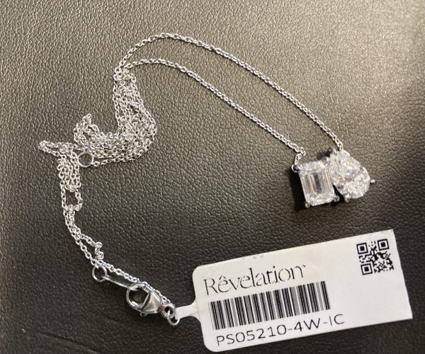 14K WHITE GOLD TOI ET MOI PENDANT W/ CHAIN, CONTAINING TWO LAB GROWN DIAMONDS. ONE PEAR SHAPE/ONE EMERALD CUT. 1.95 TCW, COLOR: F-G, CLARITY: VS, 2.0 DWT, IGI# 32J654962405 CHAIN IS 16 1/2 OR 17 1/2, YOU CAN WEAR THE LENGTH EITHER OR.