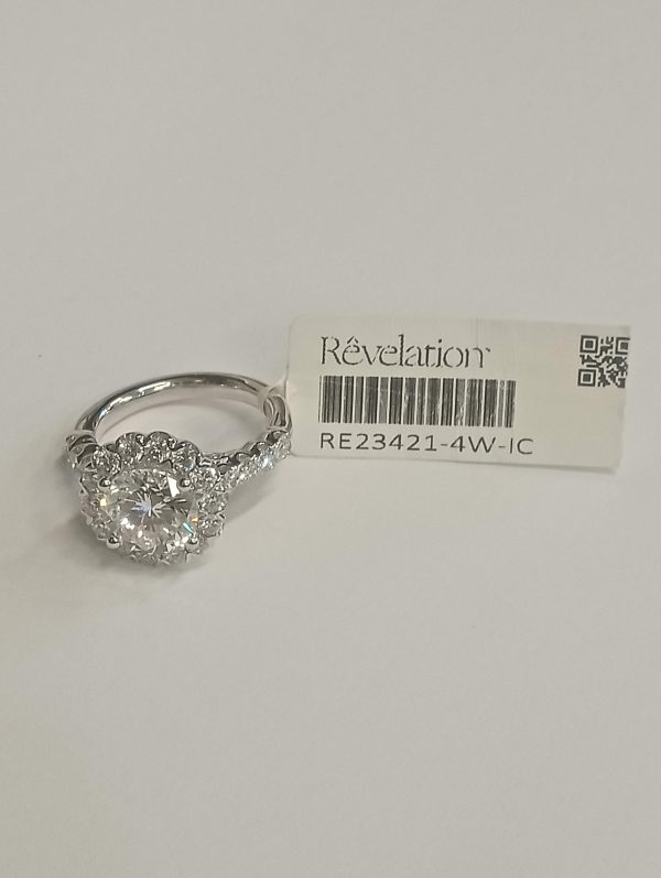 14K WHITE GOLD ELEGANT HALO RING CONTAINING 35 ROUND BRILLIANT LAB GROWN DIAMONDS. (1)CENTER - 3.01 TCW,     (34)SIDE - 1.38 TCW. BOTH CENTER & SIDES DIAMONDS - 4.39 TCW COLOR: F-G, CLARITY: VS, 5.3 DWT. IGI# 29J185052404 COMES W/ CERT CARD