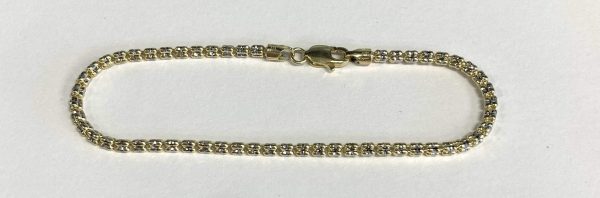 7" 14K TWO-TONE TRAVEL TENNIS BRACELET. 4.0G