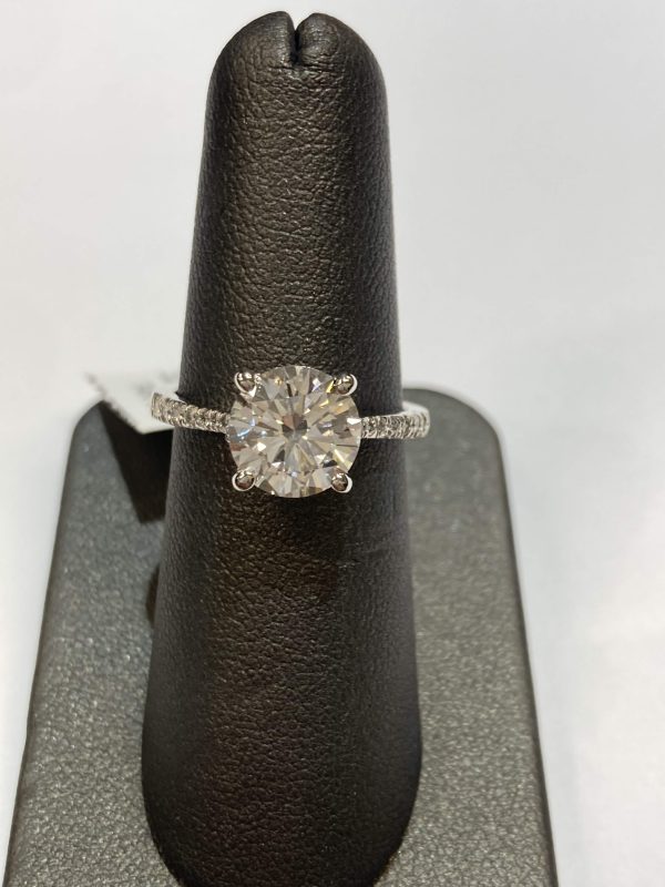 14K W/G LAB GROWN DIAMOND ENGAGEMENT RING FEATURING A ROUND BRILLIANT CUT CENTER WEIGHING 2.19 CARATS AND PAVE SET SIDE STONE/HIDDEN HALO WEIGHING A TOTAL OF 0.23 PTS. TOTAL CARAT WEIGHT: 2.42 CTS. 1.8 DWT.