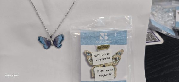 RHODIUM NECKLACE PURPLE, BLUE, & BLACK BUTTERFLY. WITH WHITE SAPPHIRES.