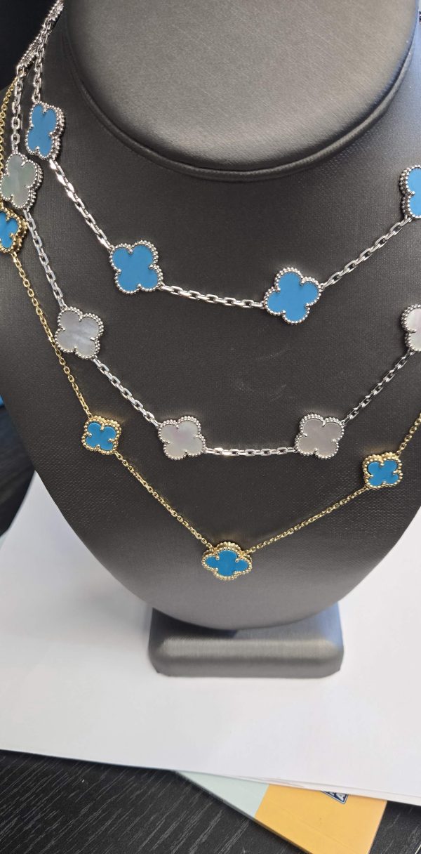 14K WG VAN CLEEF ALHAMBRA HOMAGE STYLE 16" NECKLACE WITH MOTHER OF PEARL ACCENT STONES. 13.8DWT