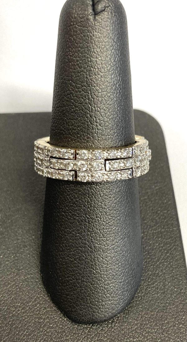 14K TWO-TONE FLEXIBLE(STRETCH) DIAMOND BAND. FEATURING ROUND BRILLIANT CUT PAVE SET DIAMONDS WEIGHING APPROX. 1.00 CARAT OF DIAMONDS, WIDTH IS 6MM, 4.4 DWT.
